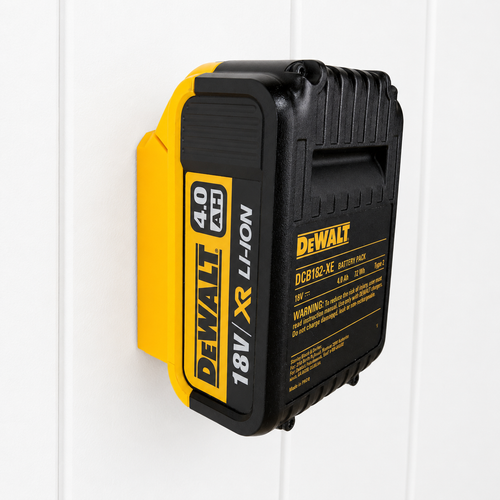 DeWalt battery pack in a bracket on a white background