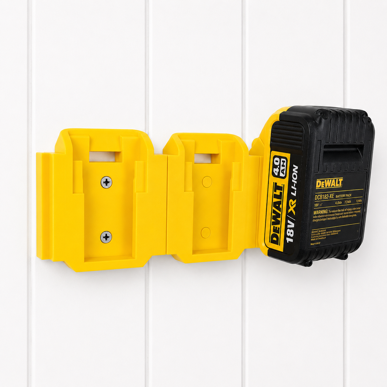 Yellow DeWalt battery holder with a DeWalt battery on a white background