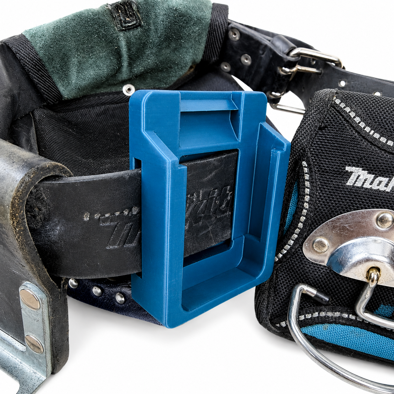 Blue Makita tool holder on a black leather belt with a white background