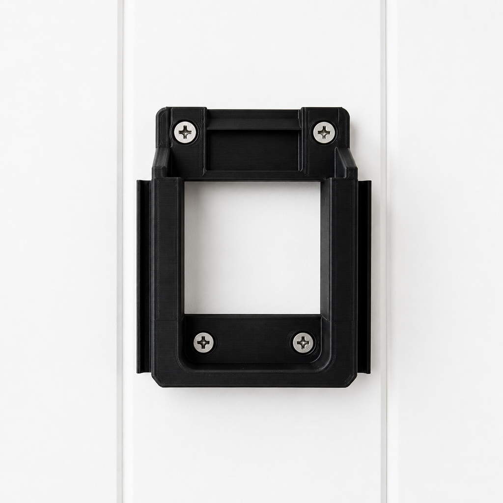 Black Makita 18v battery bracket with screws on a white background