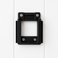 Black Makita 18v battery bracket with screws on a white background