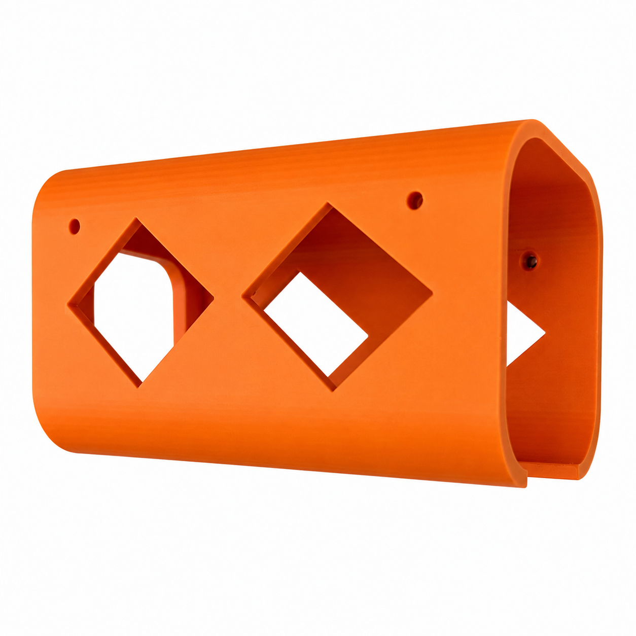 Orange plastic tool holder with geometric cutouts on a white background